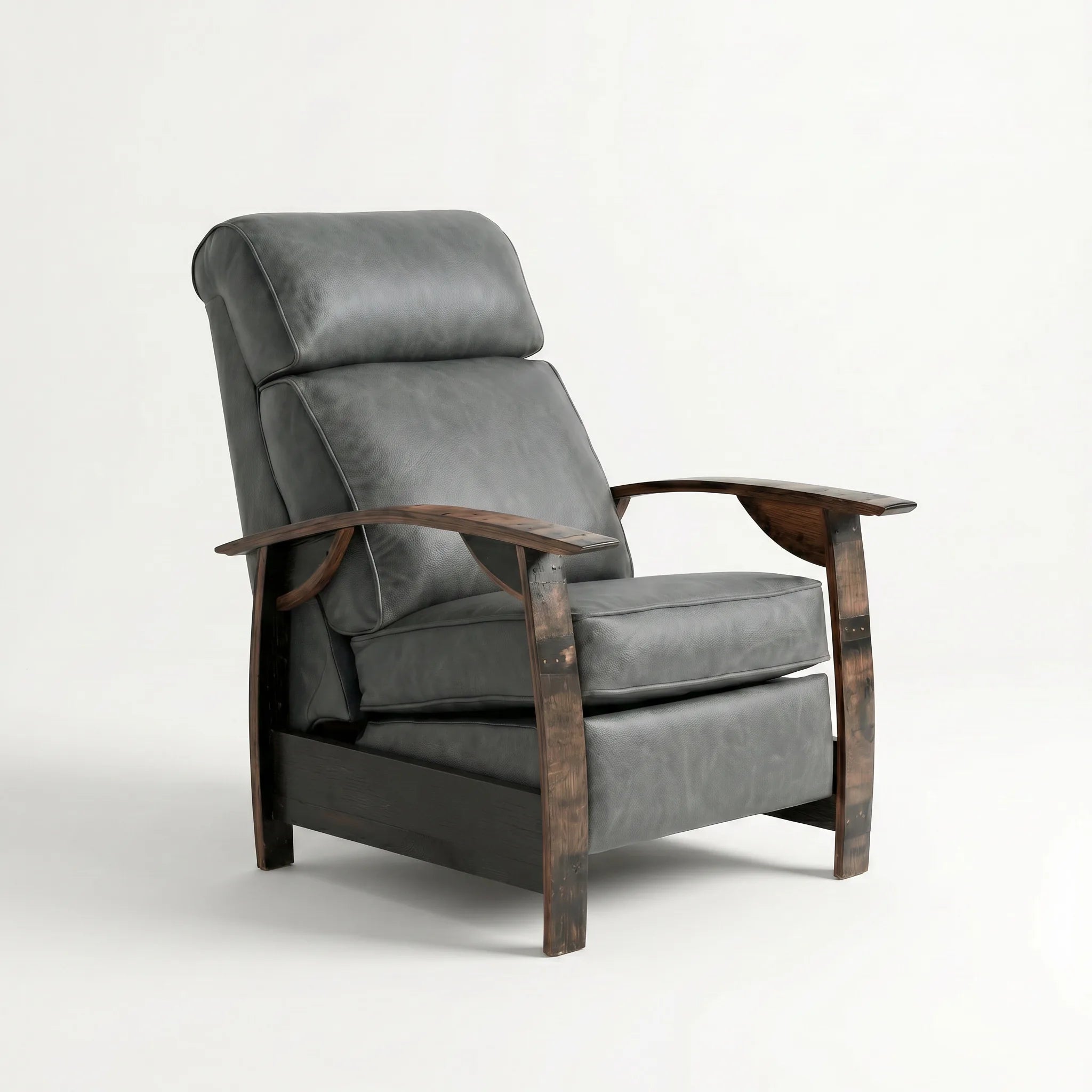 Whiskey barrel recliner chair in slate gray leather with oak whiskey-barrel stave armrests, upright, on a white background