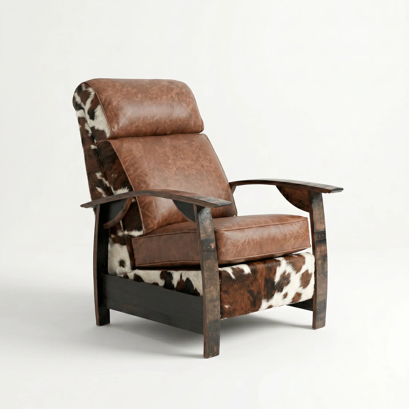 Whiskey barrel recliner chair in tri-color cowhide and leather with oak whiskey-barrel stave armrests, upright, on a white background