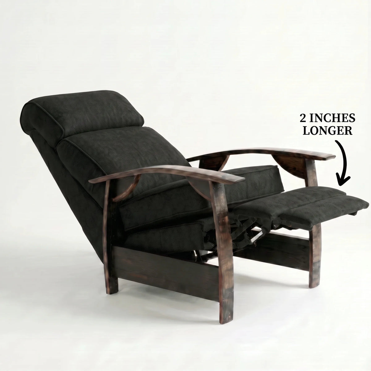 Extra Tall black plush fabric whiskey barrel recliner reclined with the 2-inch-longer footrest extended and oak whiskey-barrel stave armrests, on a white background