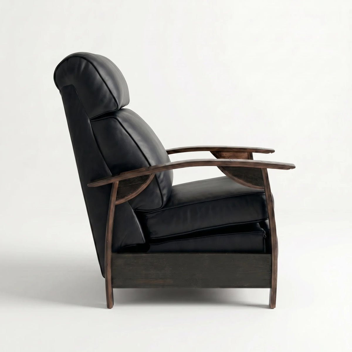 Side profile of the black leather whiskey barrel recliner, upright and closed, on a white background