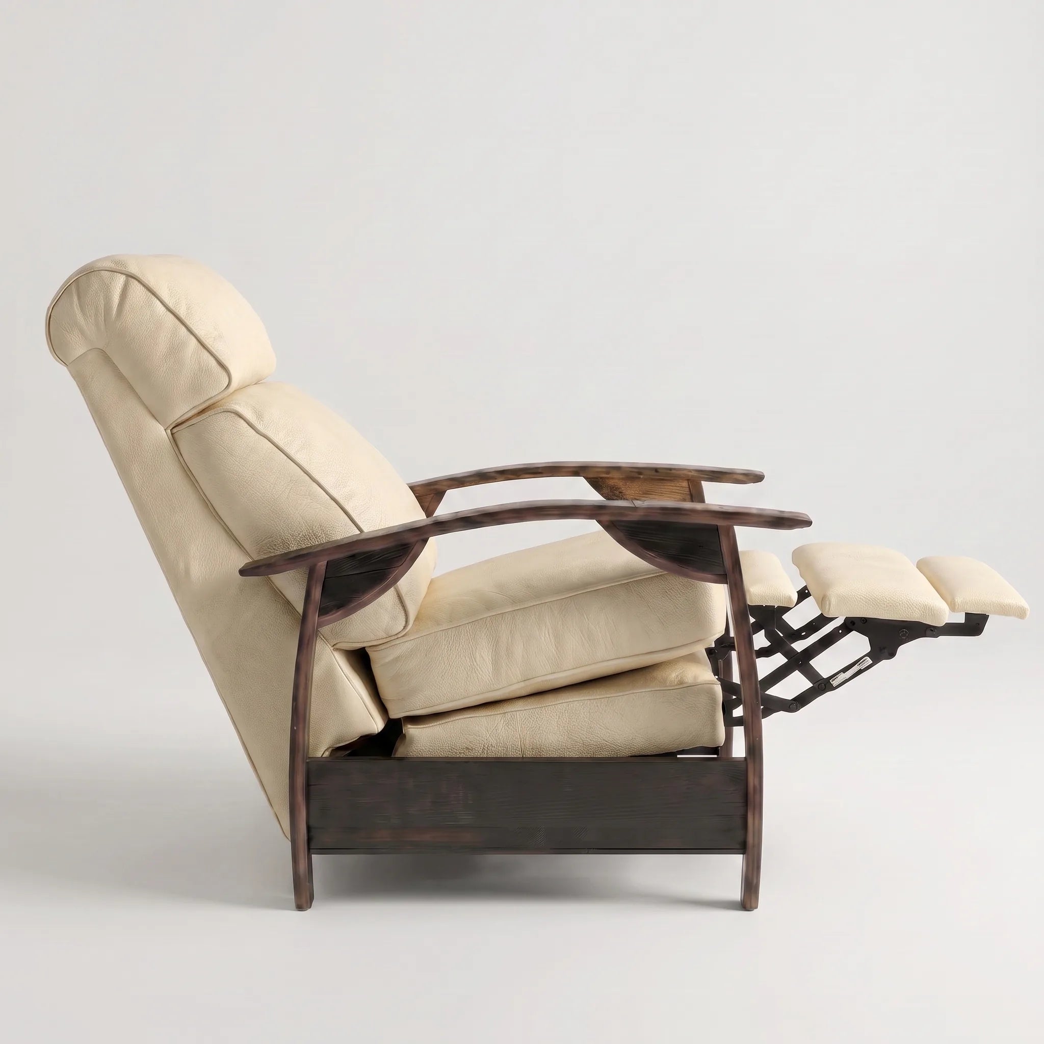 Side view of the Big & Tall cream ivory leather whiskey barrel recliner partly reclined with footrest out, on a white background