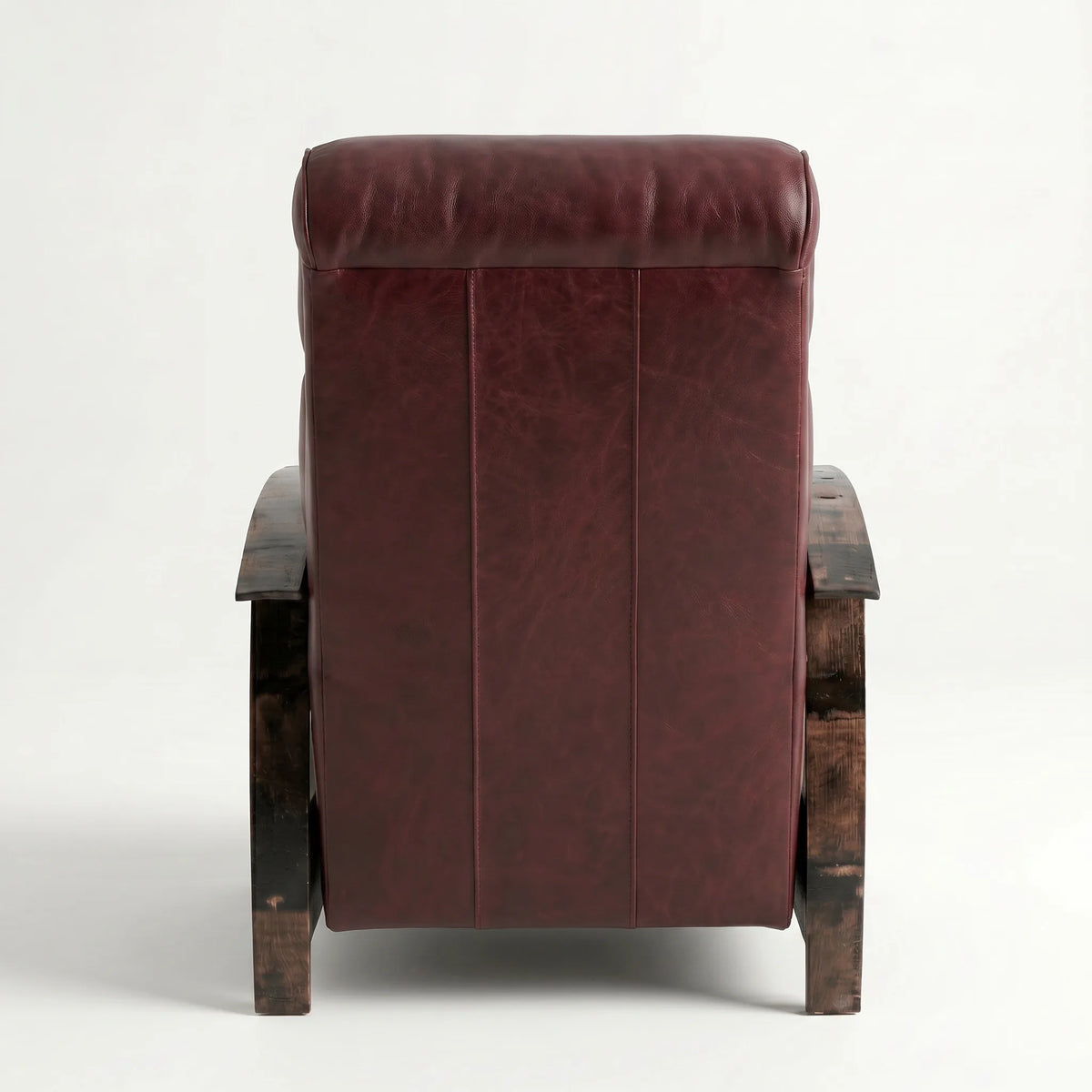 Rear view of the oxblood leather whiskey barrel recliner showing the back panel, on a white background