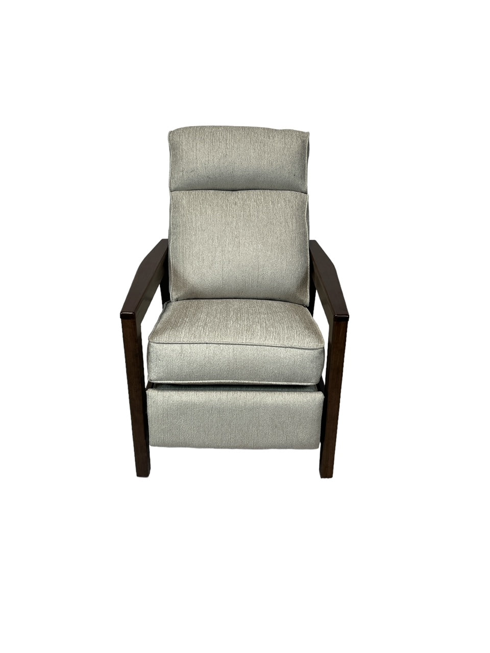 A modern mid century modern recliner with dark wooden armrests.