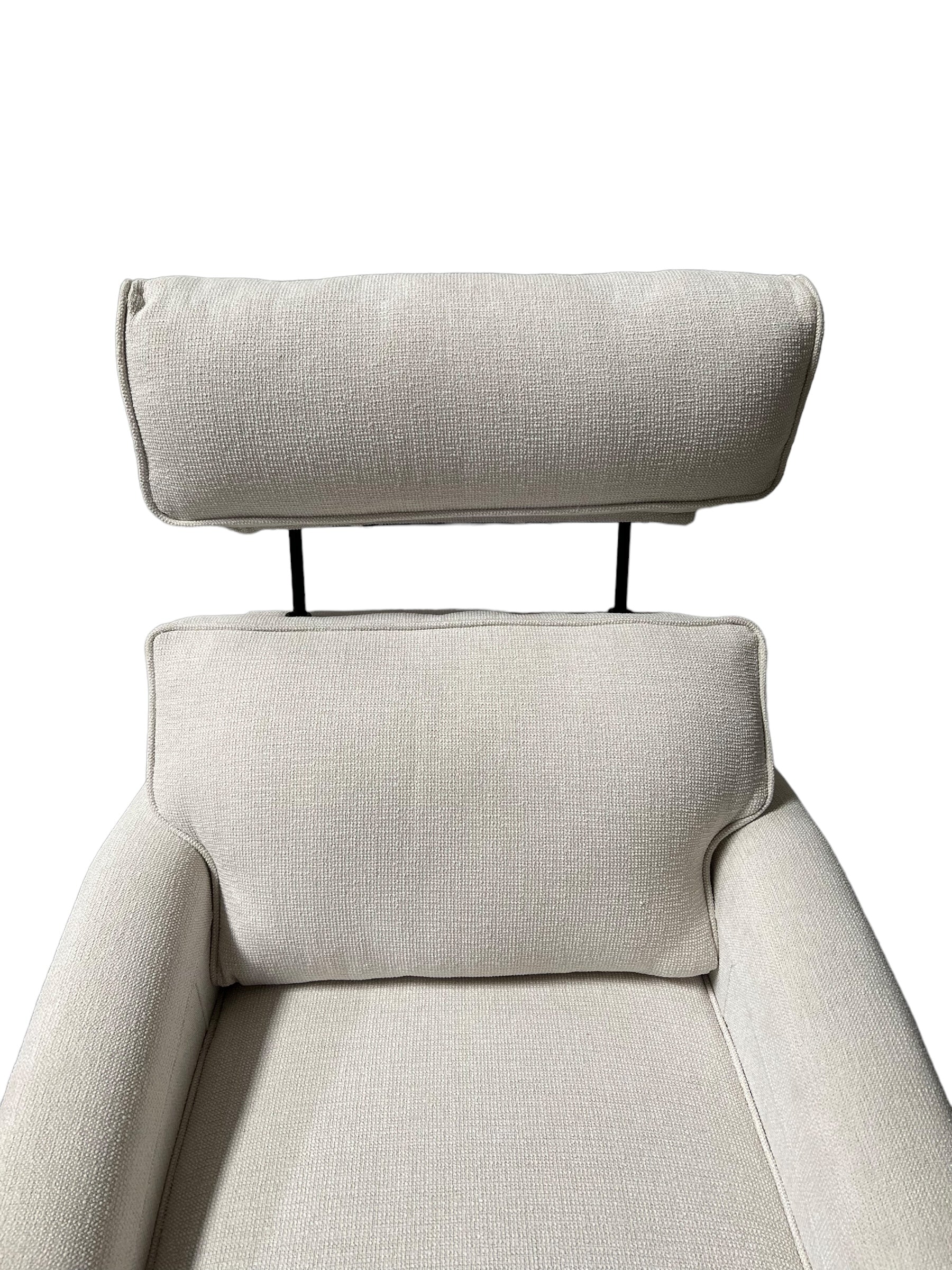Modern light gray rocker recliner chair with a headrest