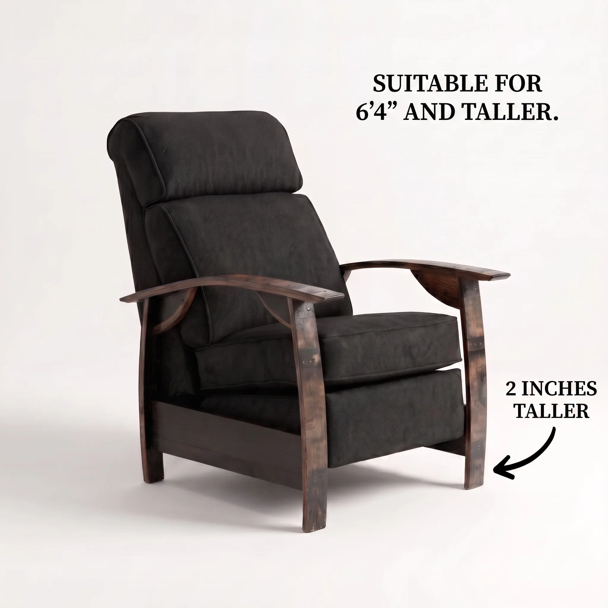 Big & Tall whiskey barrel recliner chair in black plush fabric with oak whiskey-barrel stave armrests, upright, on a white background, labelled suitable for 6'4" and taller with legs 2 inches taller