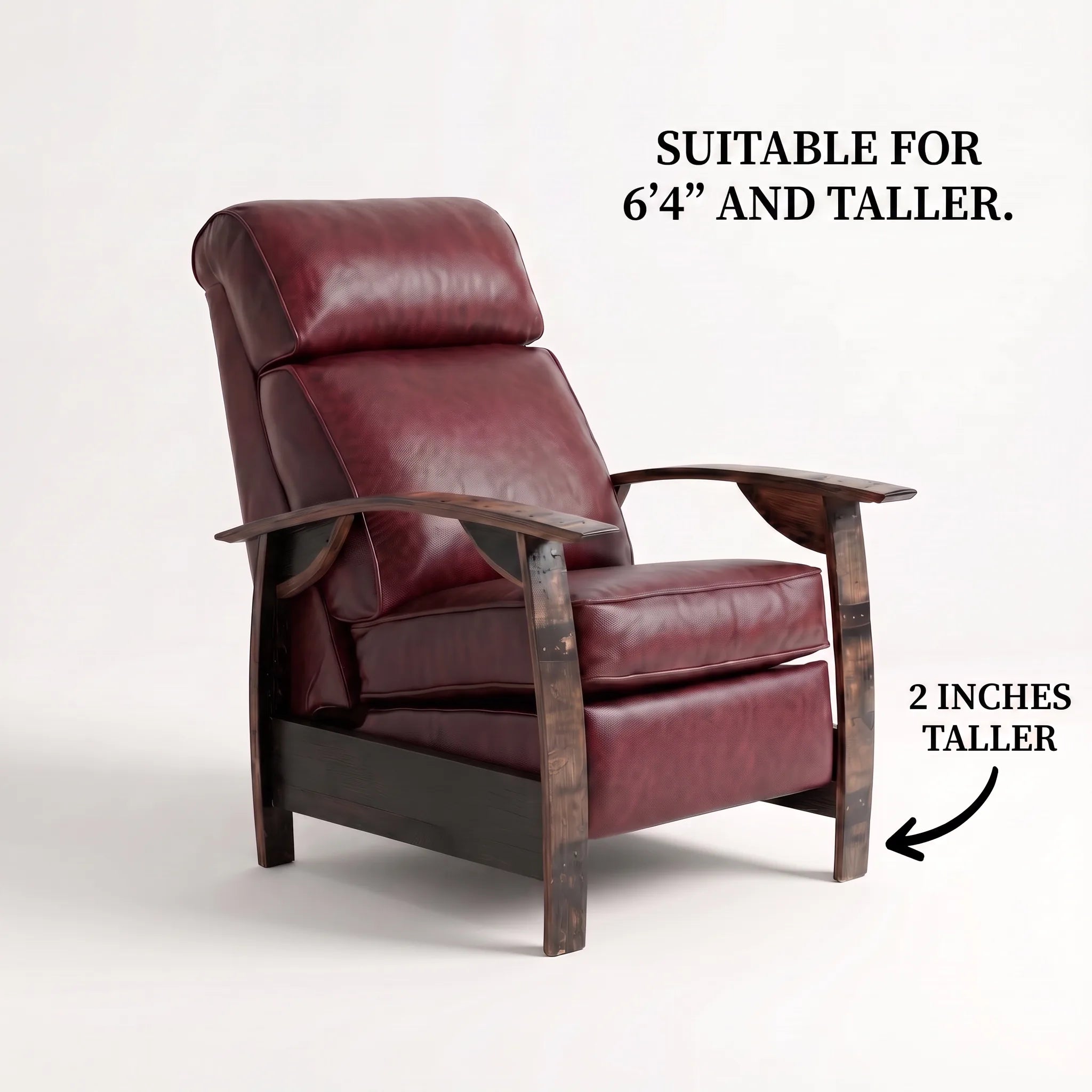 Big & Tall whiskey barrel recliner chair in deep oxblood burgundy leather with oak whiskey-barrel stave armrests, upright, on a white background, labelled suitable for 6'4" and taller with legs 2 inches taller