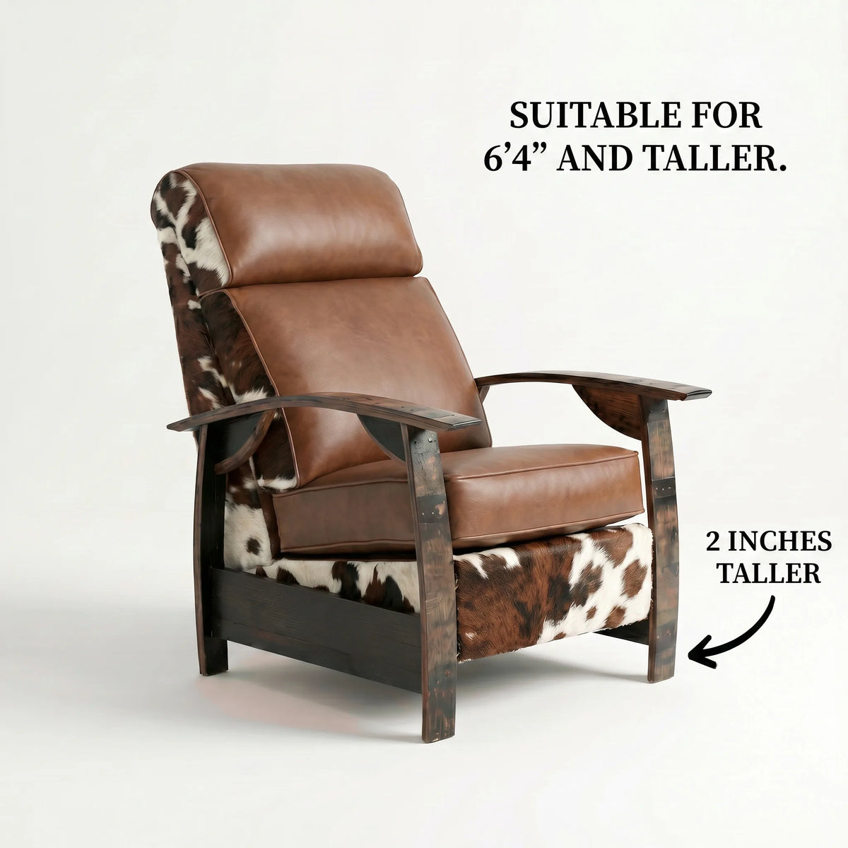 Extra Tall whiskey barrel recliner chair in tri-color cowhide and leather with oak whiskey-barrel stave armrests, upright, on a white background, labelled suitable for 6'4" and taller with legs 2 inches taller