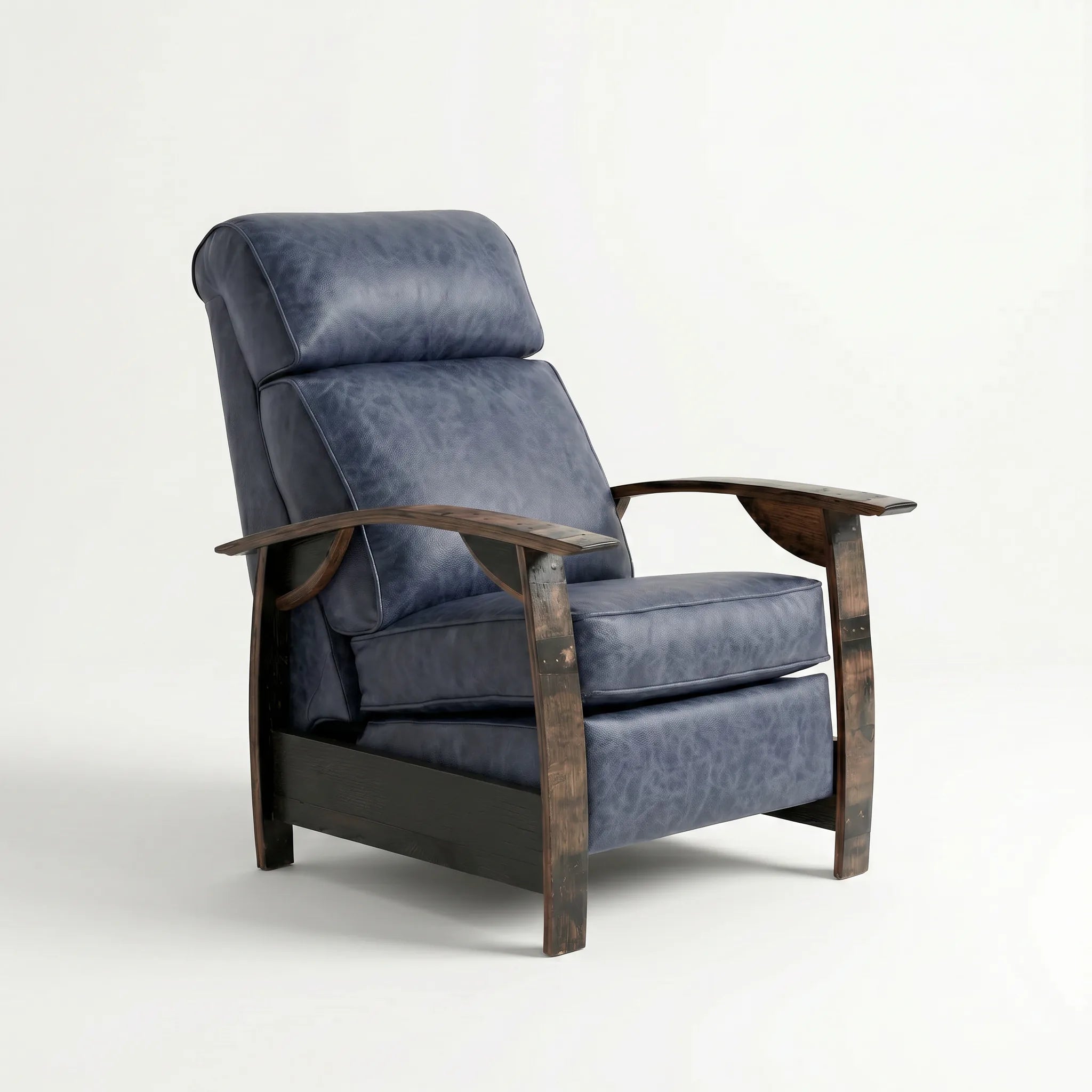 Whiskey barrel recliner chair in denim blue distressed leather with oak whiskey-barrel stave armrests, upright, on a white background