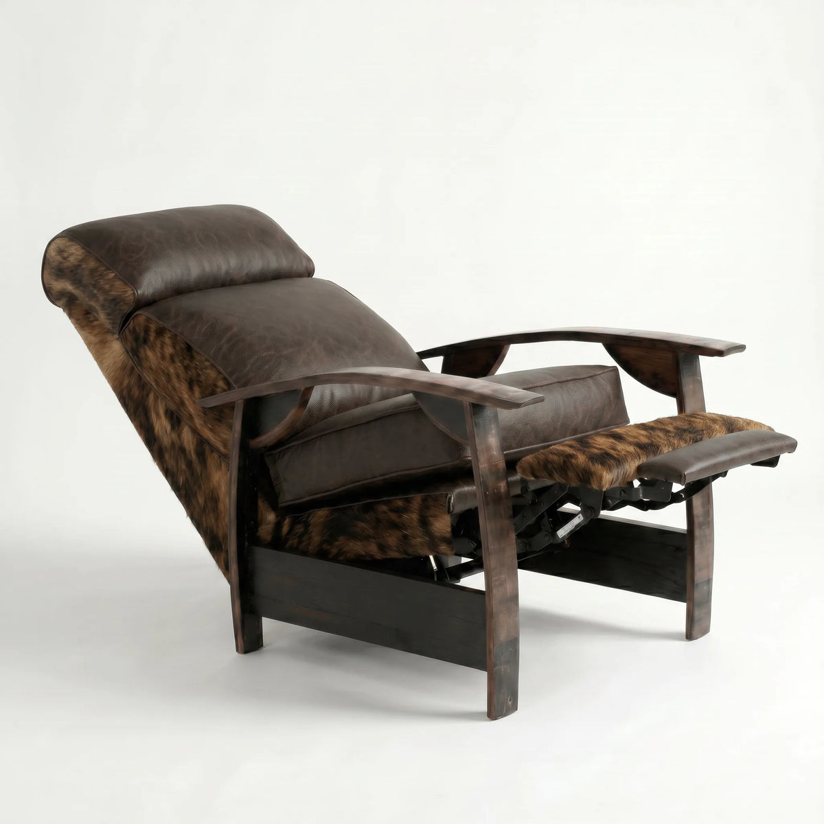 Brindle cowhide whiskey barrel recliner reclined with footrest extended and oak whiskey-barrel stave armrests, on a white background