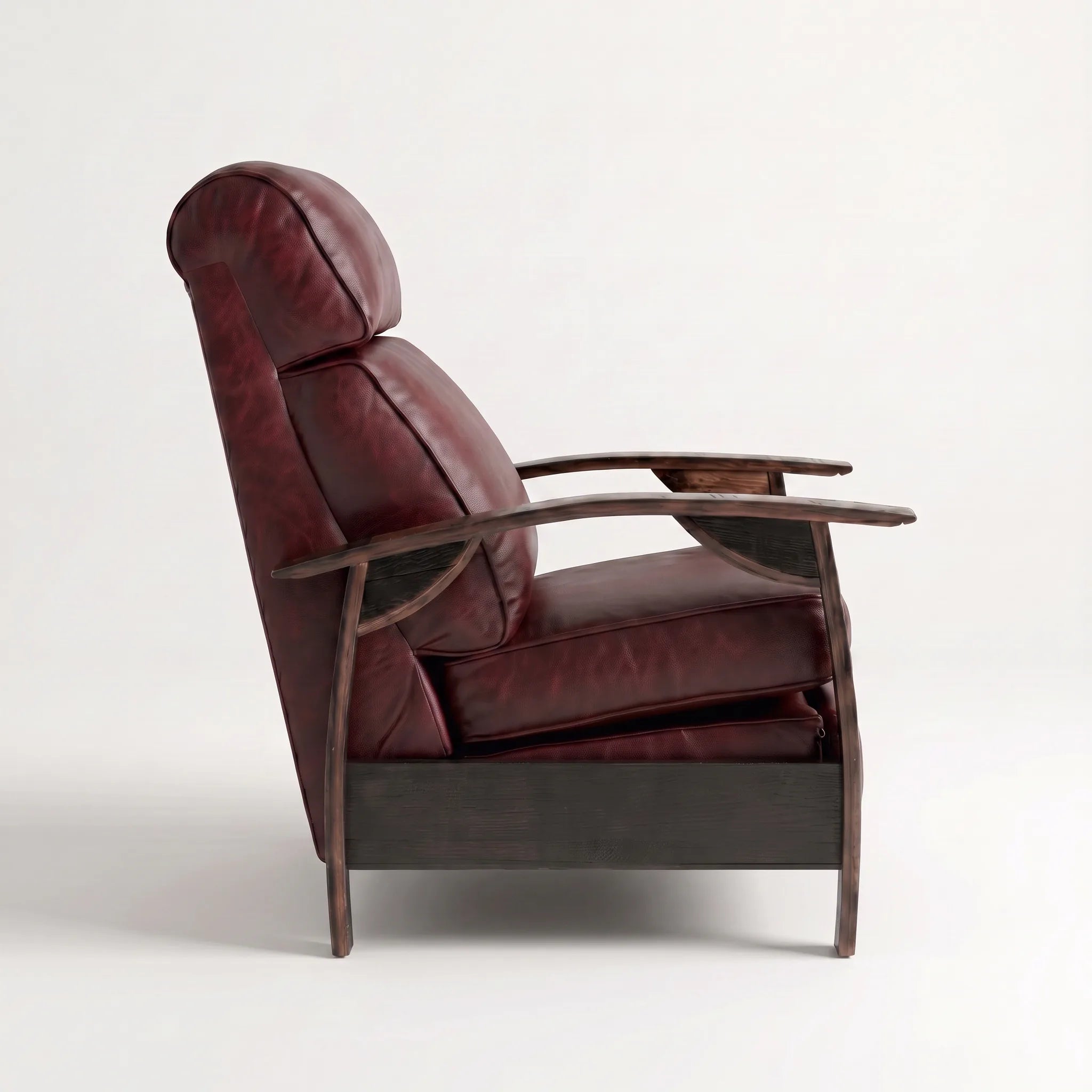 Side profile of the Big & Tall oxblood leather whiskey barrel recliner, upright and closed, on a white background