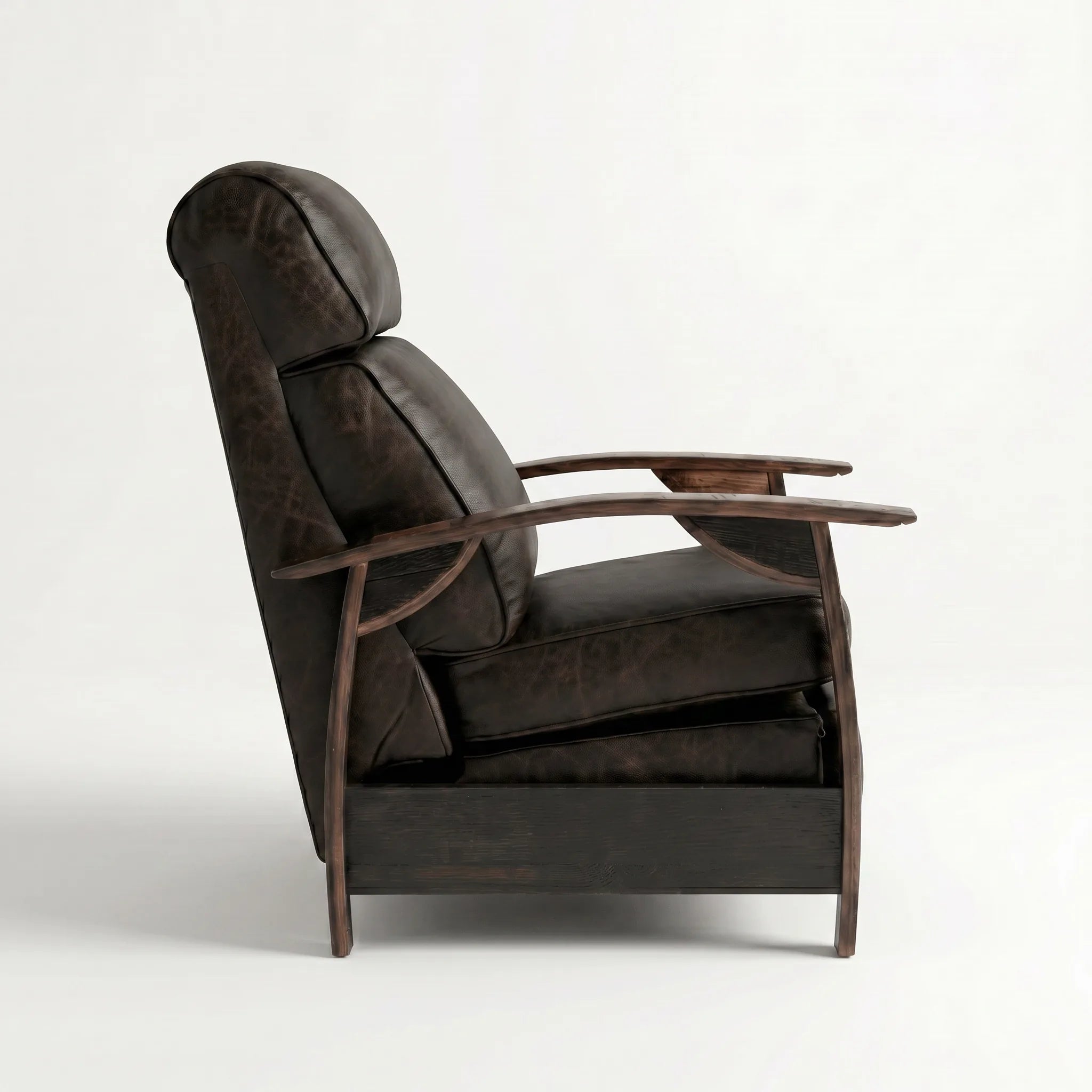 Side profile of the cognac brown leather whiskey barrel recliner, upright and closed, on a white background