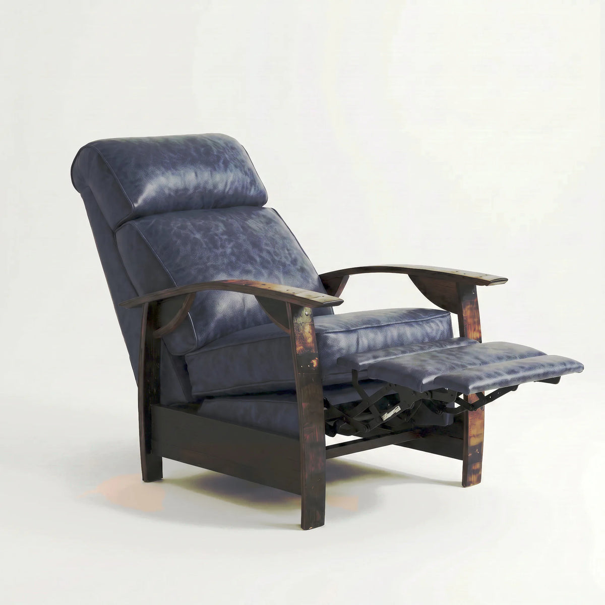 Side view of the Extra Tall denim blue leather whiskey barrel recliner partly reclined with footrest out, on a white background