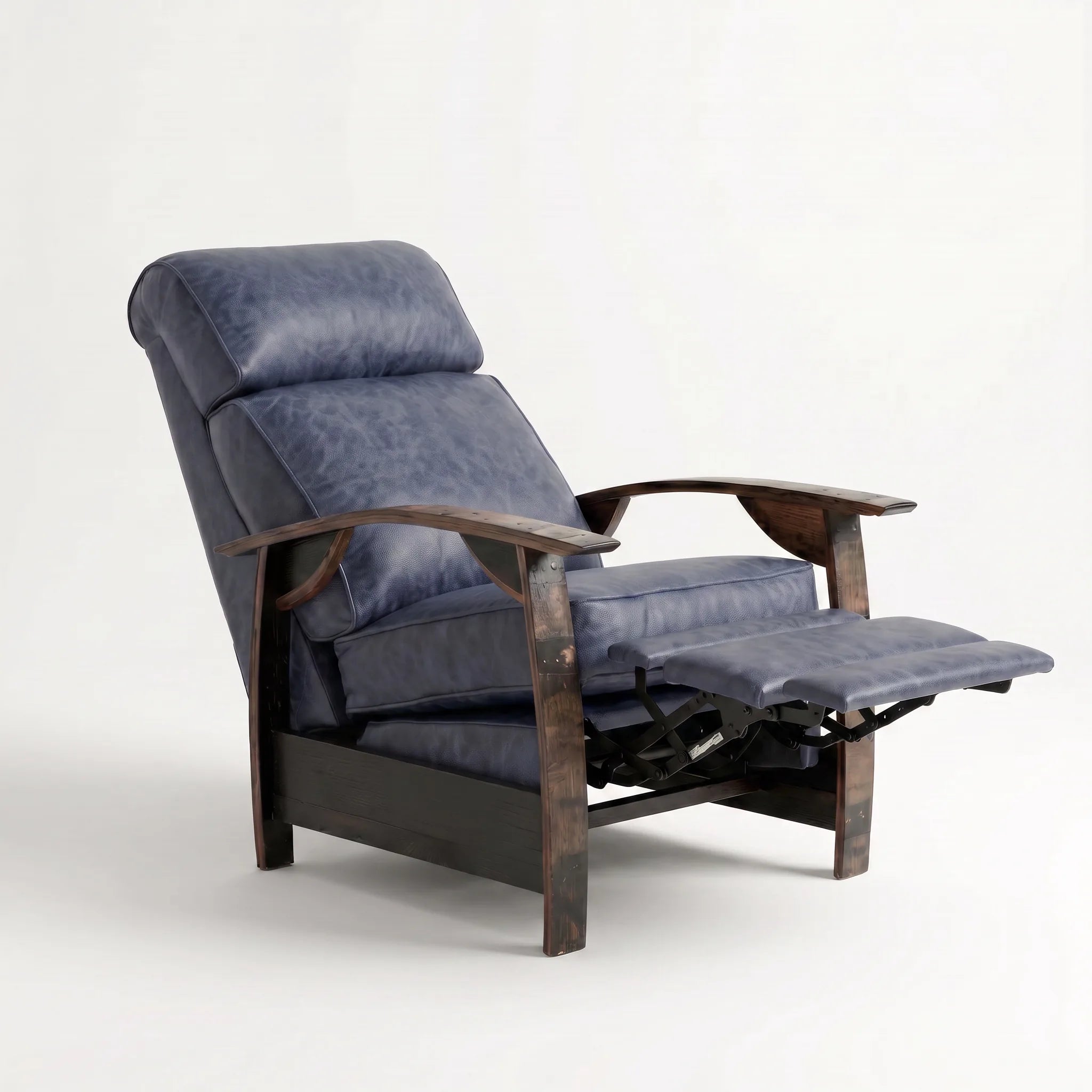 Side view of the Big & Tall denim blue leather whiskey barrel recliner partly reclined with footrest out, on a white background