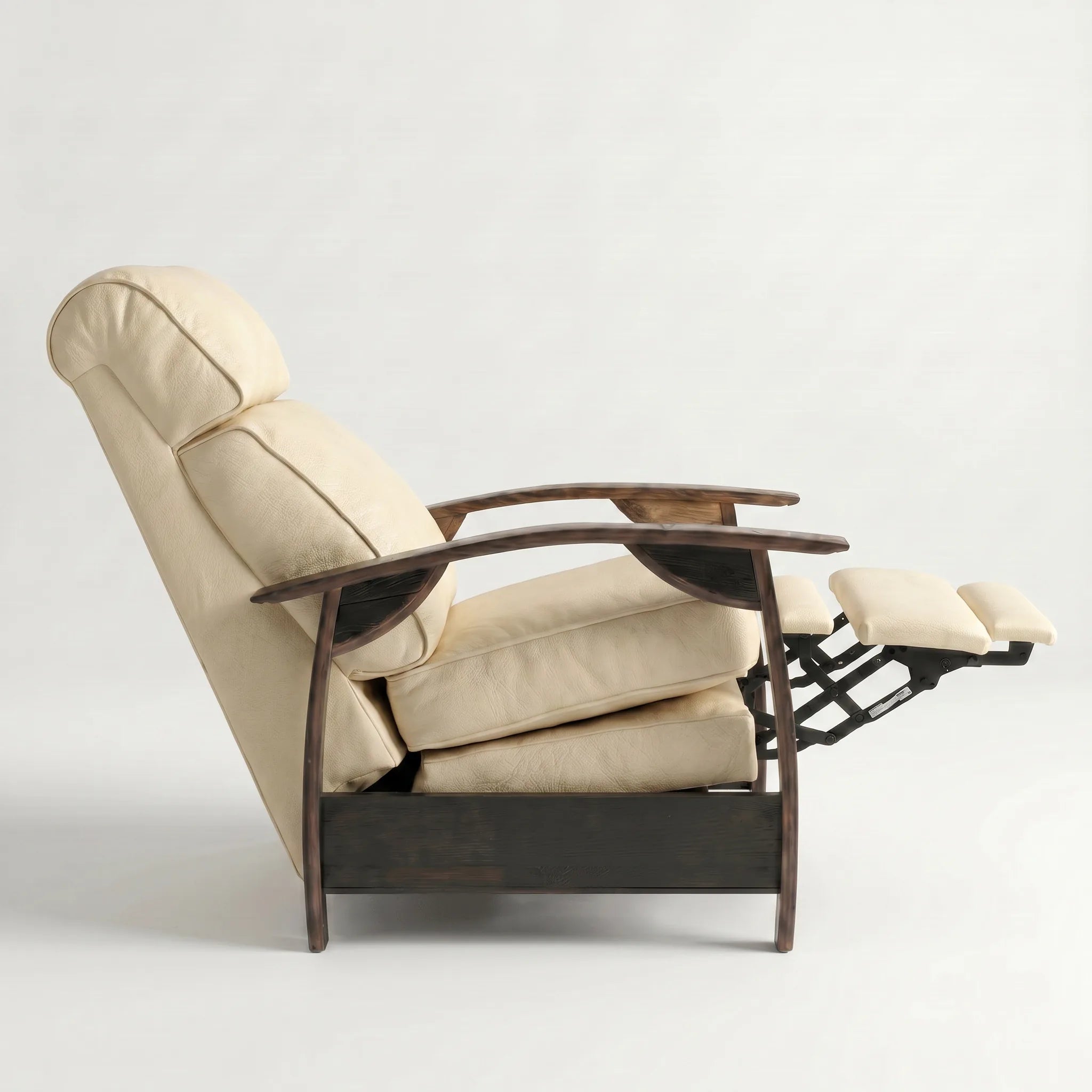 Side view of the cream ivory leather whiskey barrel recliner partly reclined with footrest out, on a white background