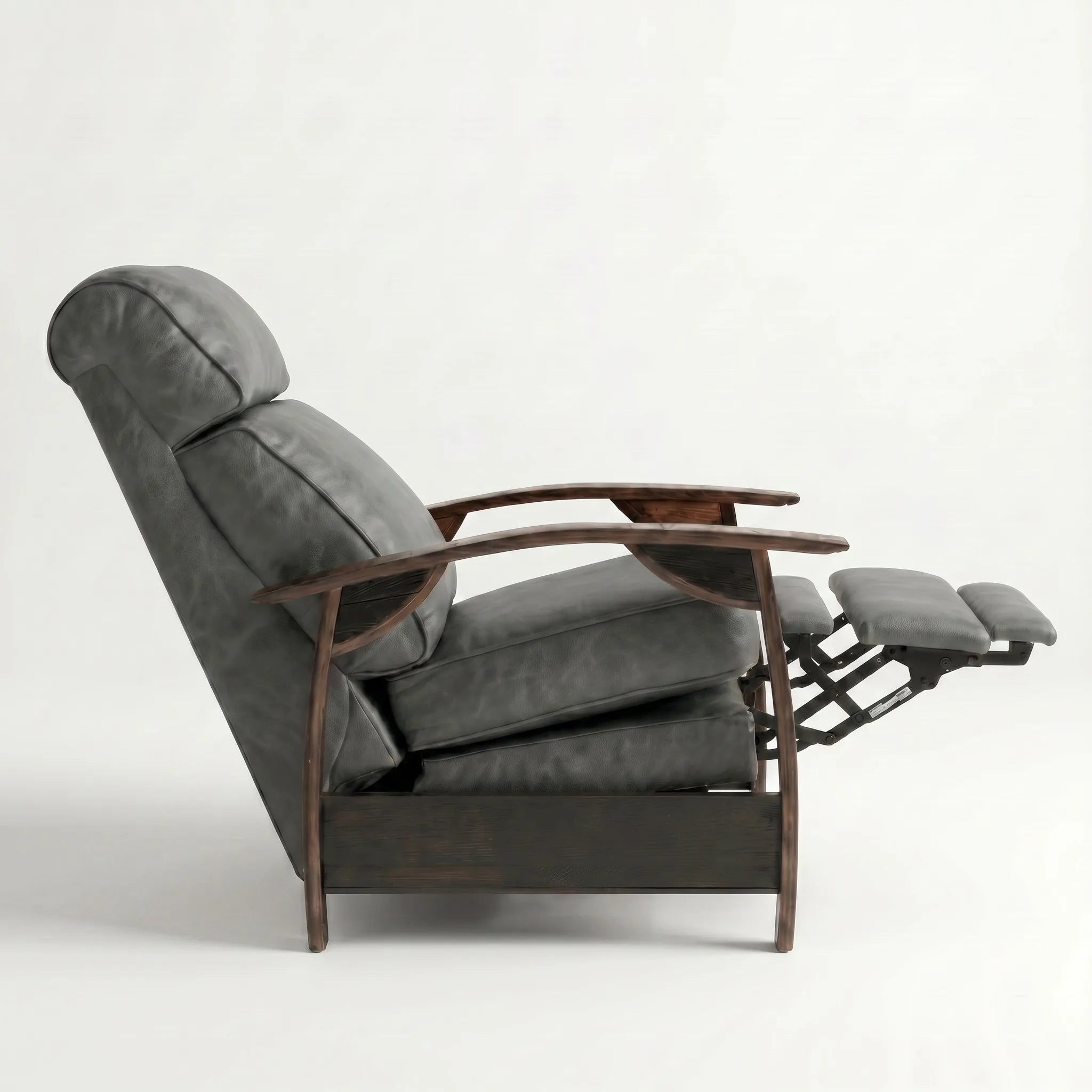 Side view of the slate gray leather whiskey barrel recliner partly reclined with footrest out, on a white background
