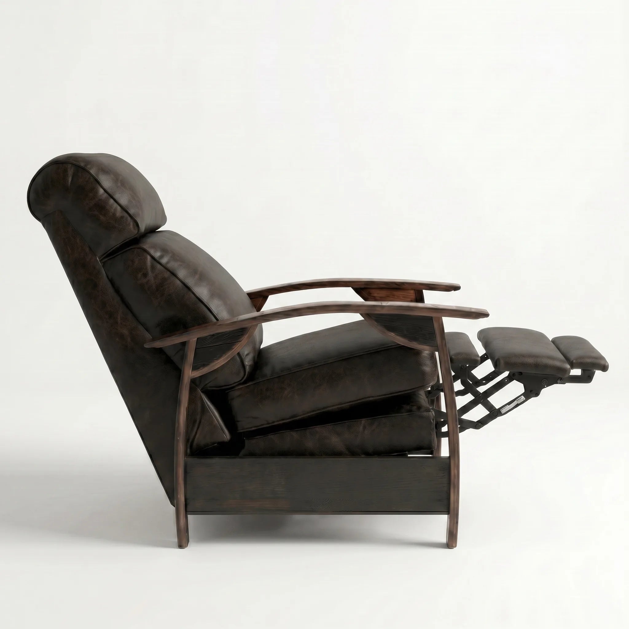 Side view of the cognac brown leather whiskey barrel recliner partly reclined with footrest out, on a white background
