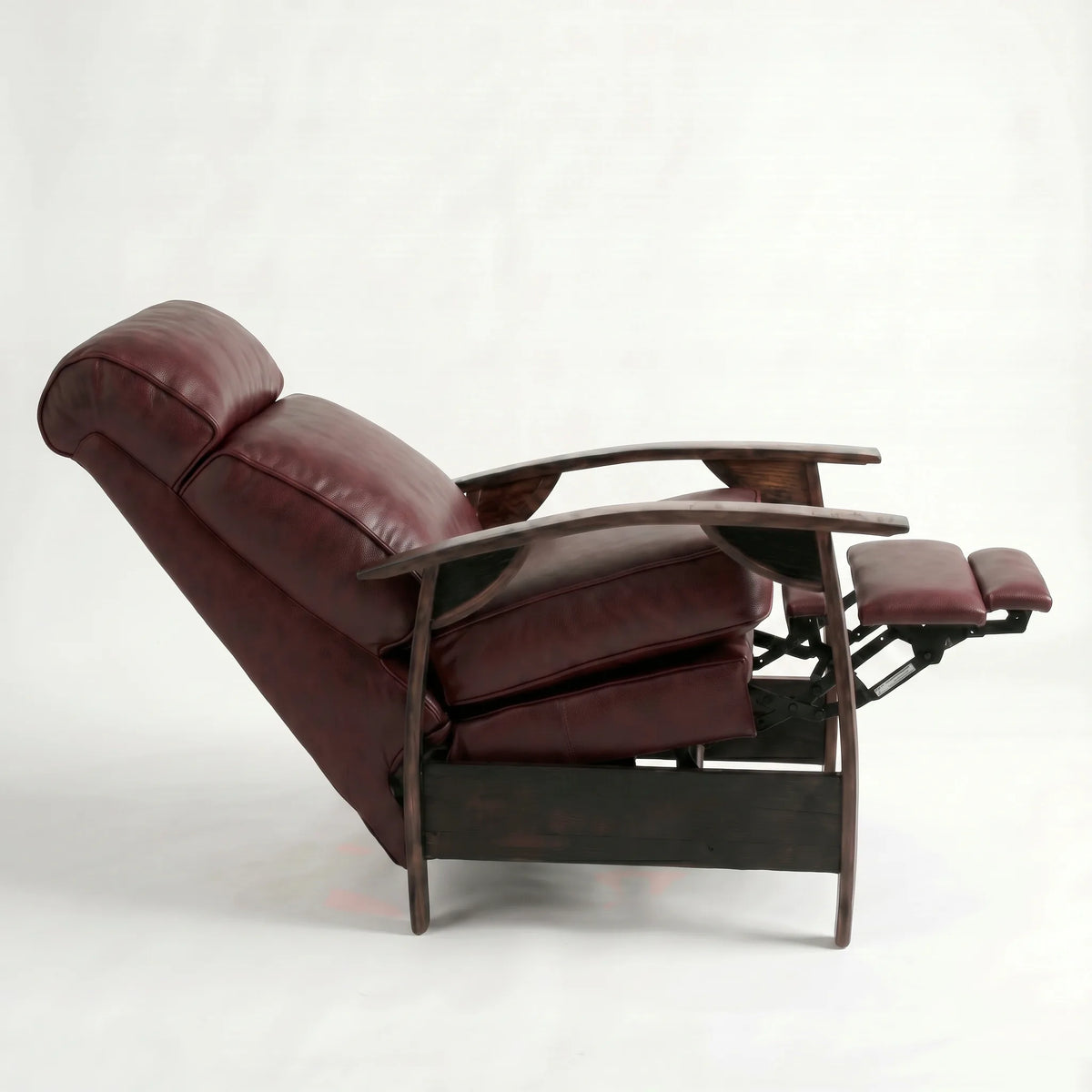 Side view of the Extra Tall oxblood leather whiskey barrel recliner fully reclined, on a white background