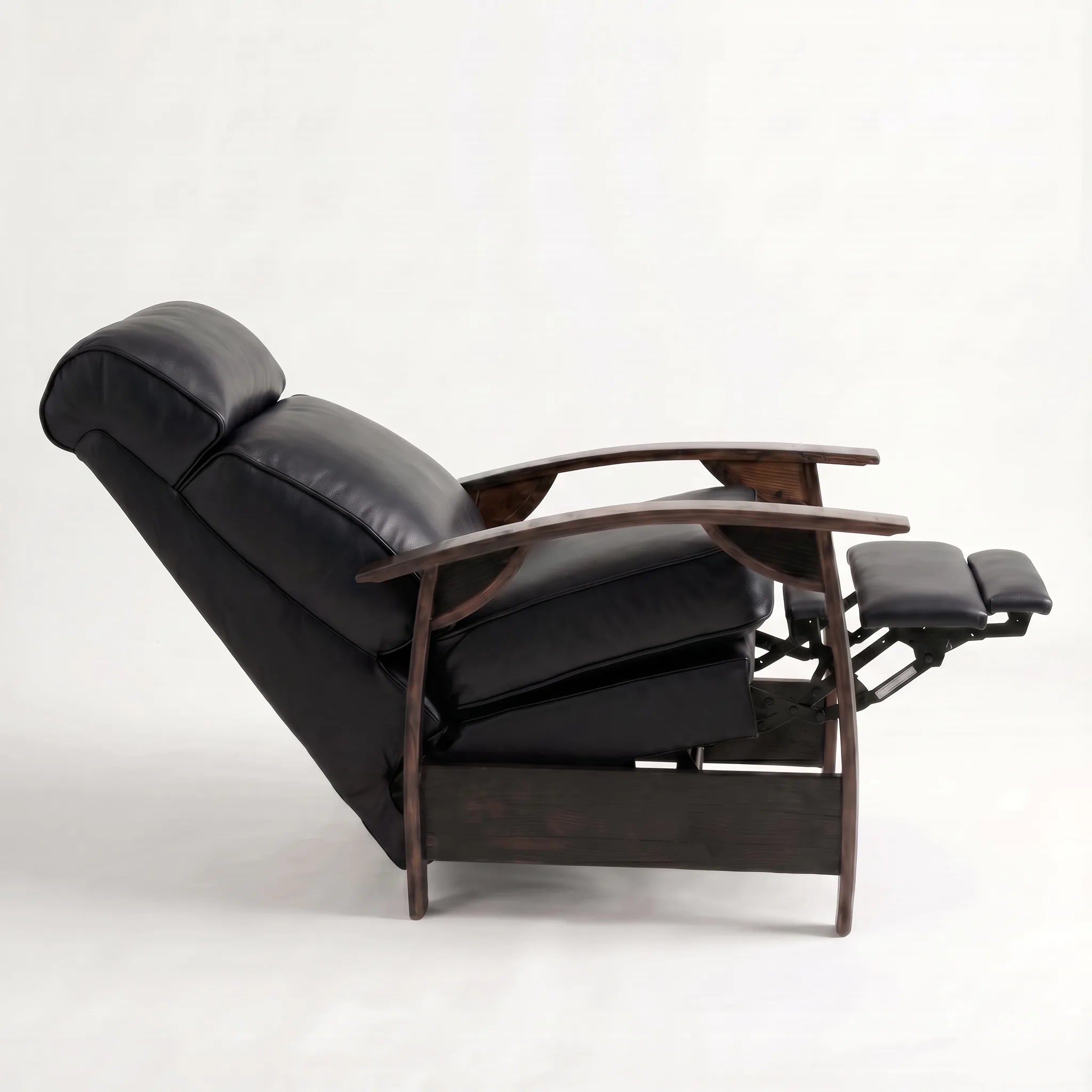 Side view of the Big & Tall black leather whiskey barrel recliner fully reclined, on a white background