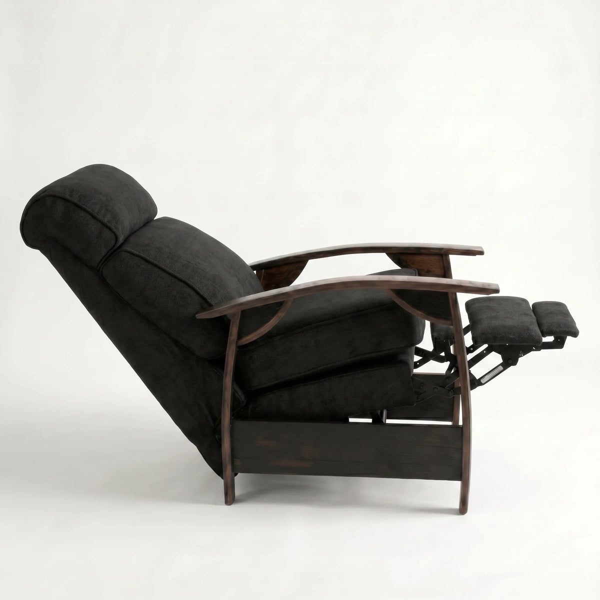 Side view of the black plush fabric whiskey barrel recliner fully reclined, on a white background