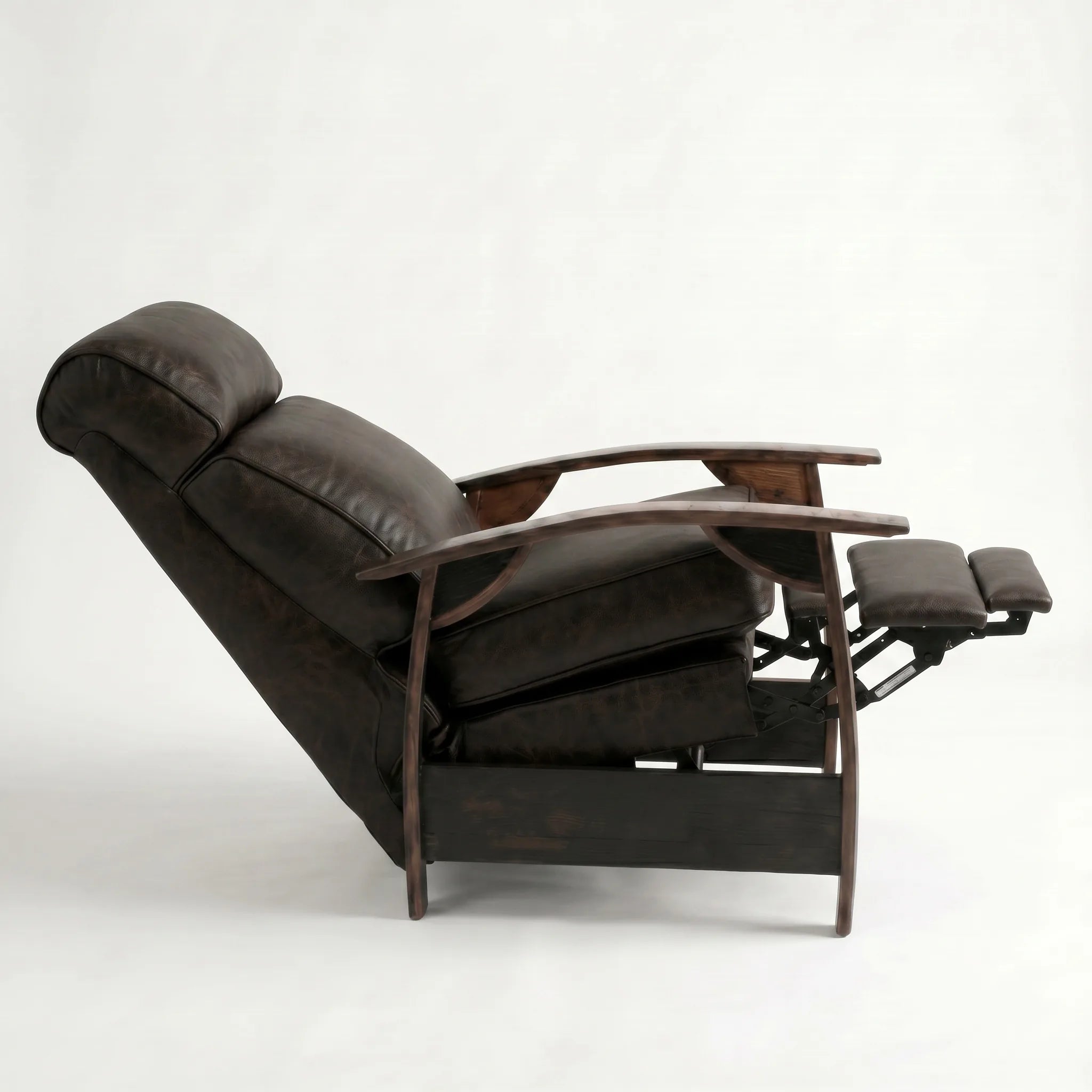 Side view of the cognac brown leather whiskey barrel recliner fully reclined, on a white background