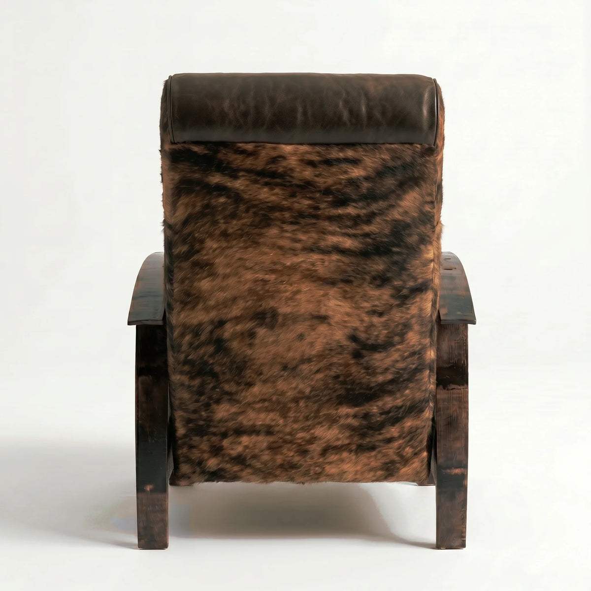 Rear view of the Extra Tall brindle cowhide whiskey barrel recliner showing the back panel, on a white background