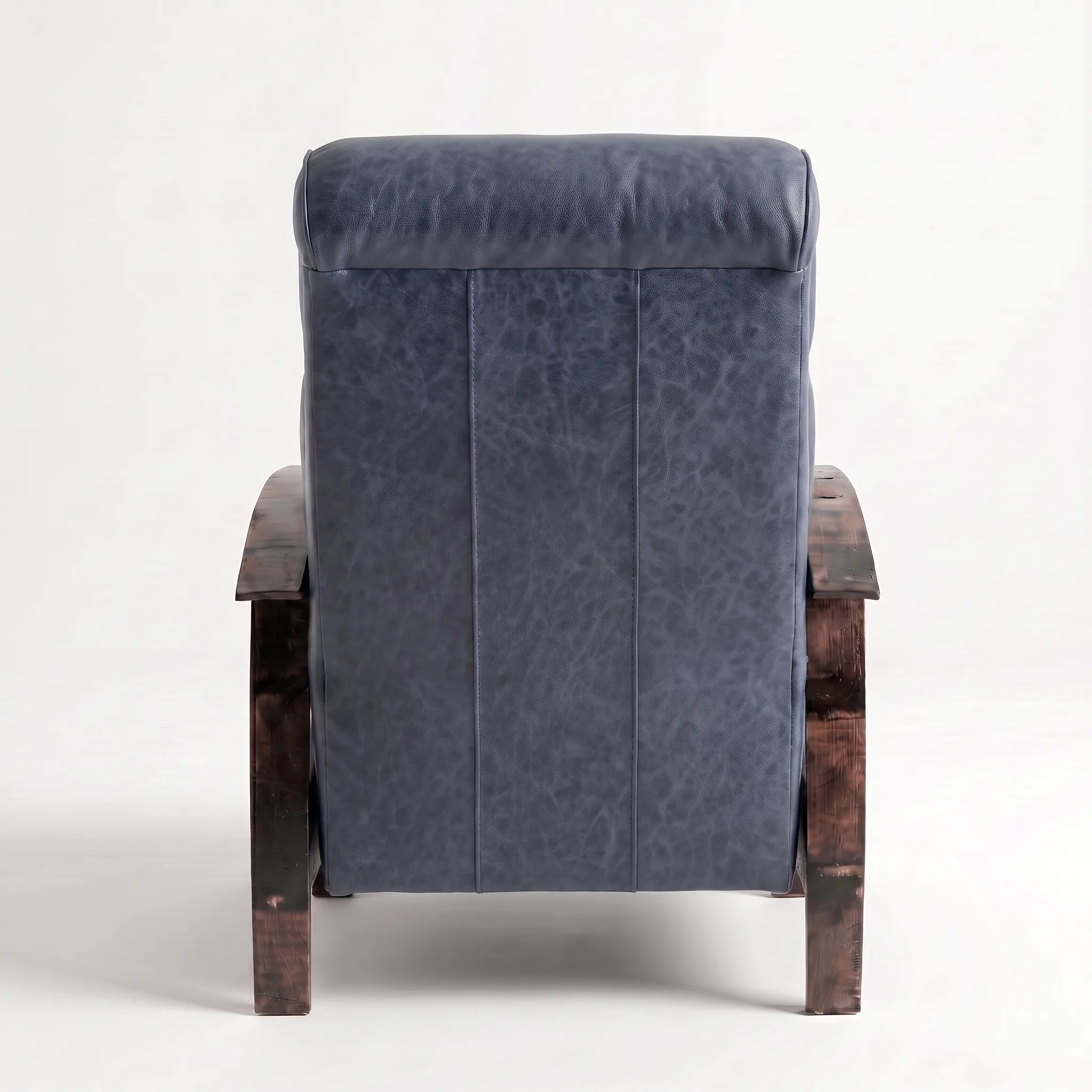 Rear view of the Big & Tall denim blue leather whiskey barrel recliner showing the back panel, on a white background