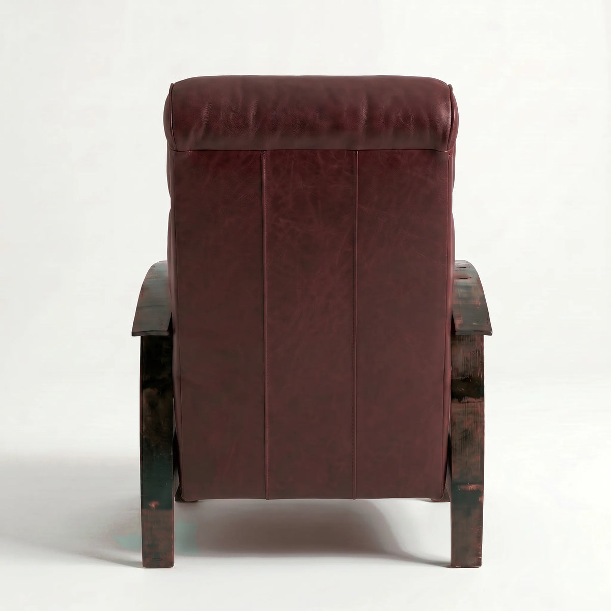 Rear view of the Extra Tall oxblood leather whiskey barrel recliner showing the back panel, on a white background