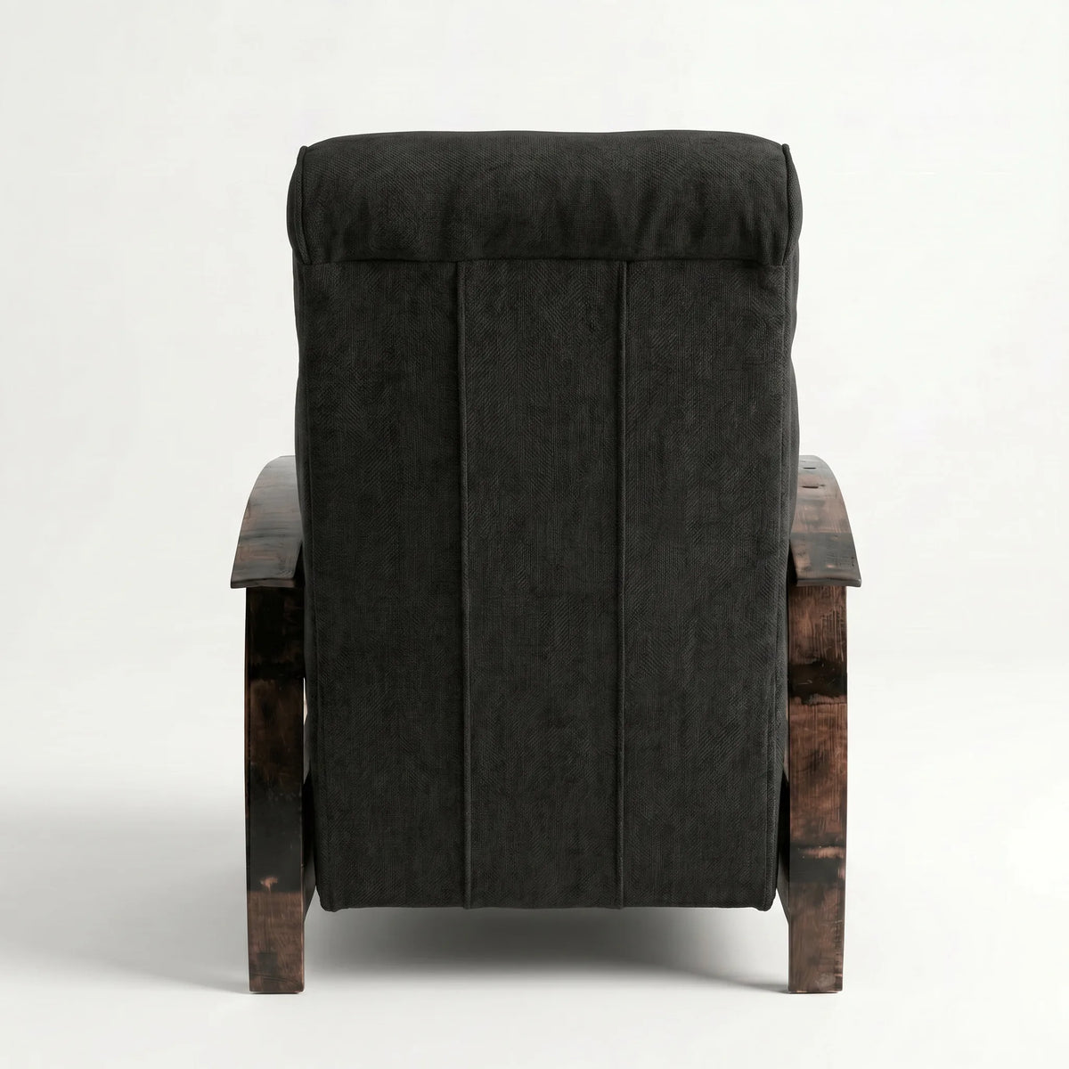 Rear view of the black plush fabric whiskey barrel recliner showing the back panel, on a white background