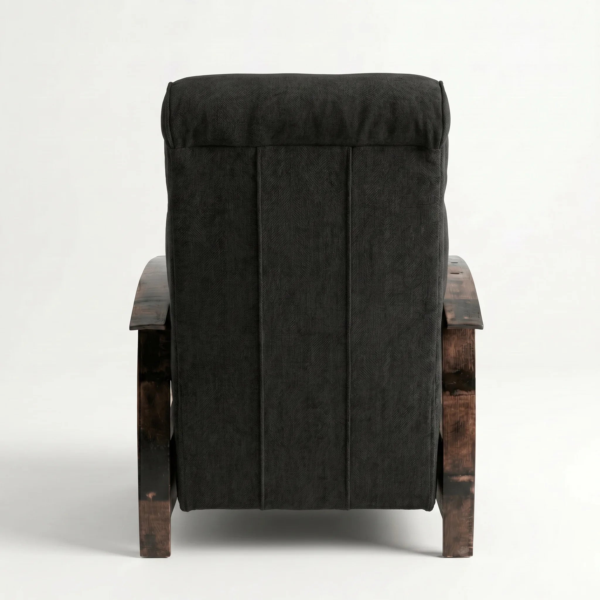 Rear view of the black plush fabric whiskey barrel recliner showing the back panel, on a white background
