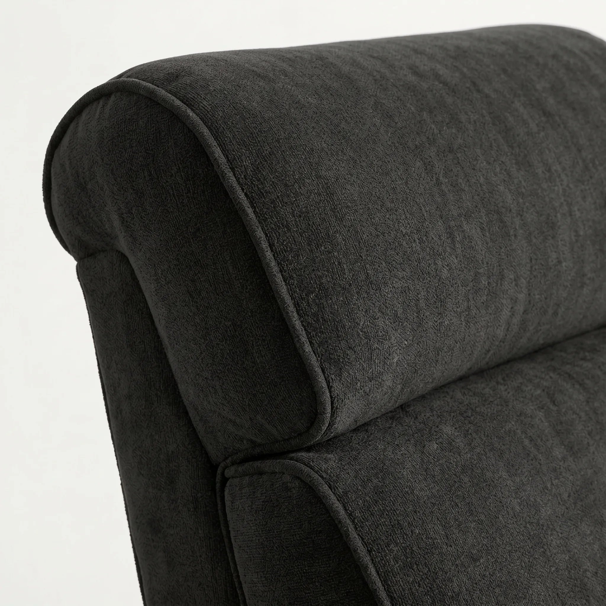 Close-up of the Big & Tall black plush fabric whiskey barrel recliner headrest and cushion, on a white background