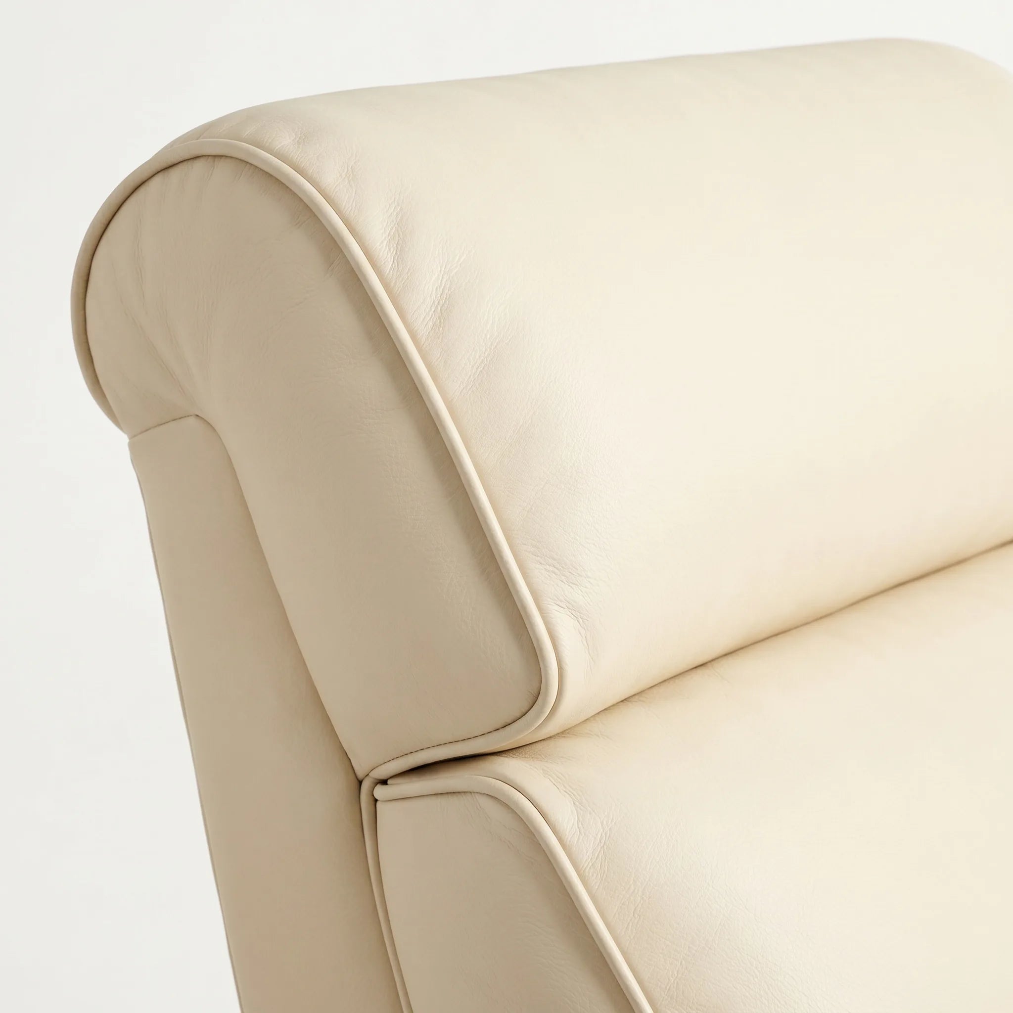 Close-up of the Big & Tall cream ivory leather whiskey barrel recliner headrest and cushion, on a white background