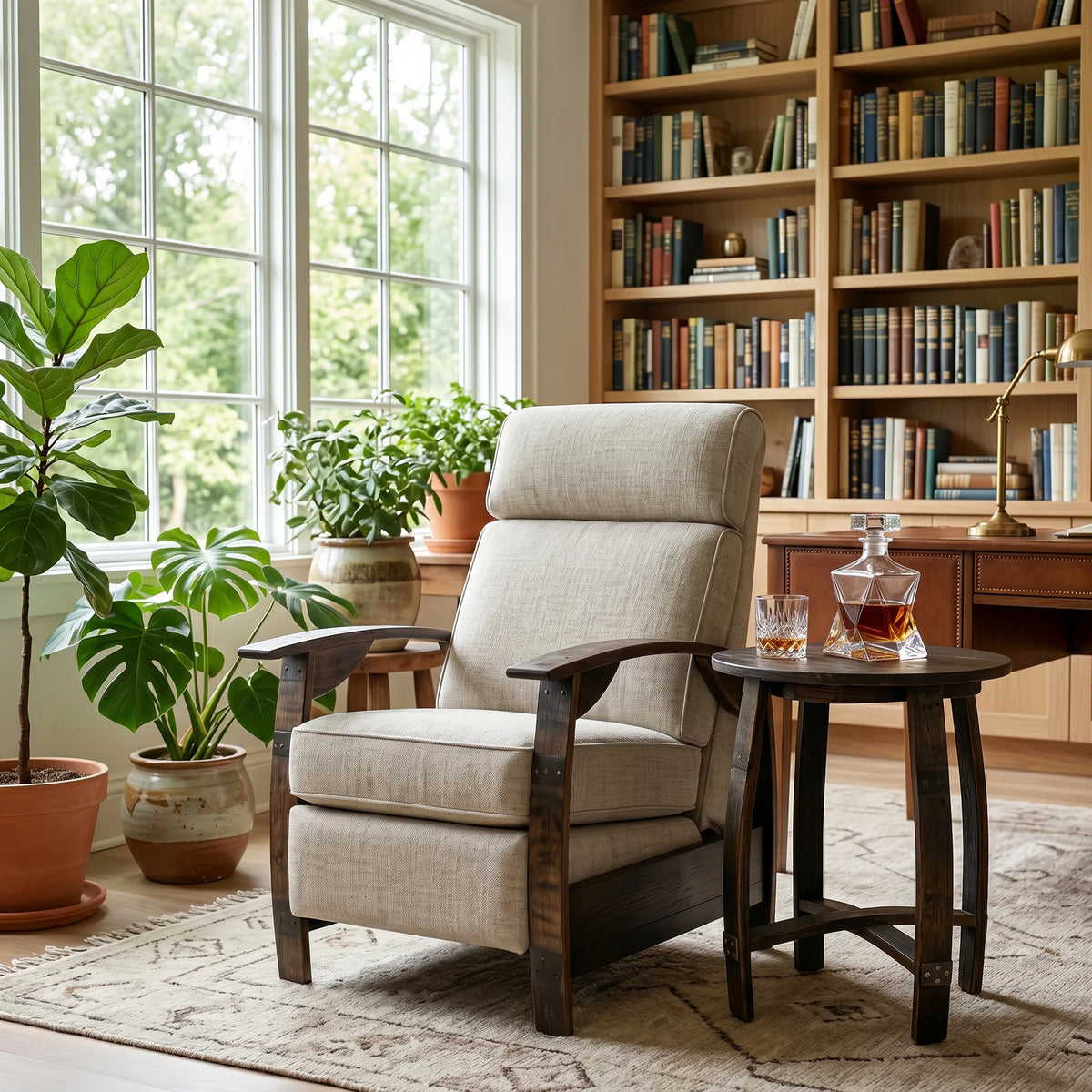 Oatmeal gray plush fabric whiskey barrel recliner styled in a sunlit home study